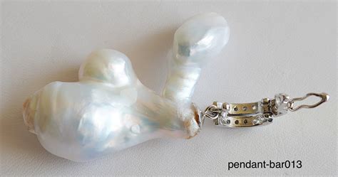 Baroque pearl Pendant/enhancer: white huge pearl with sparkling sterling silver enhancer ...