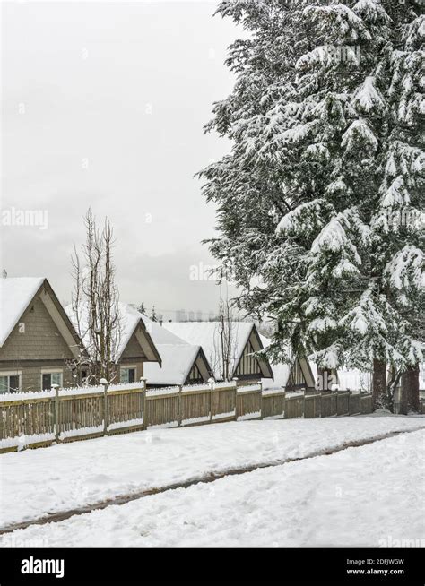 Row of residential houses in snow. Winter in Canada Stock Photo - Alamy