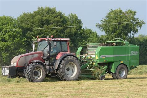 Valtra T180 Tractor with a McHale Fusion 2 Baler & Wrapper… | Flickr