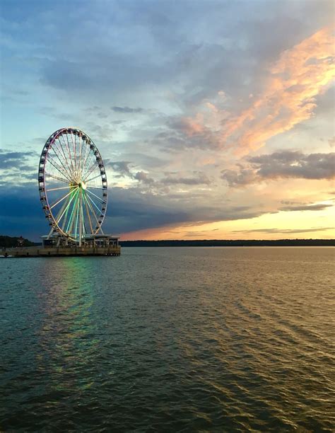 ITAP of a Ferris Wheel on the National Harbor at sunset | Profundo