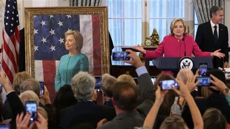 Hillary Clinton at portrait unveiling swipes at Trump, Putin