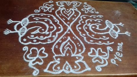 Peacock kolam with 15 dots || Contest Kolam – Kolams of India