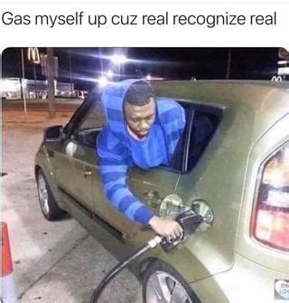 a man is pumping gas into his car