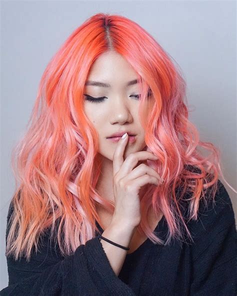 Neon Peach Hair Is Instagram's Biggest Summer Hair-Color Trend | Allure in 2020 | Hair color ...