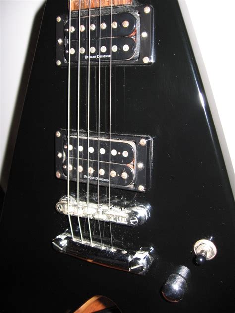 ESP LTD Flying "V" with large body and Gibson Style Headstock