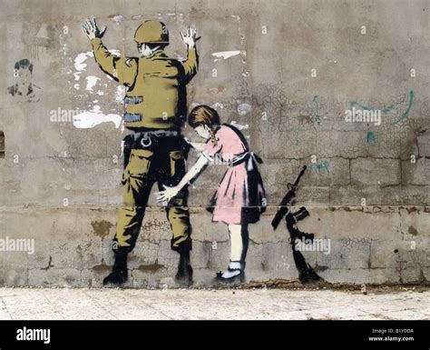 Banksy, soldier and girl, Bethlehem, Palestine Stock Photo - Alamy