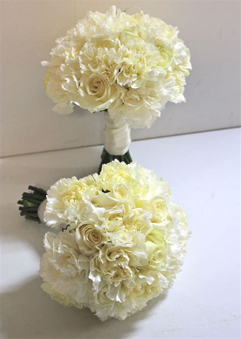 Very simple carnation bouquets with a few white roses....repinned by ...