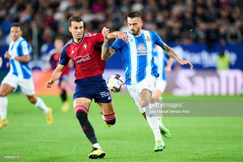 Lucas Torro of CA Osasuna duels for the ball with Jose Luis Mato ...