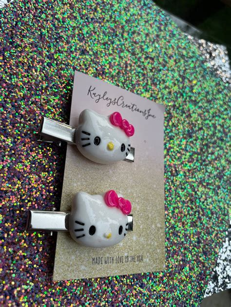 Two piece set of hello kitty hair clips | Etsy