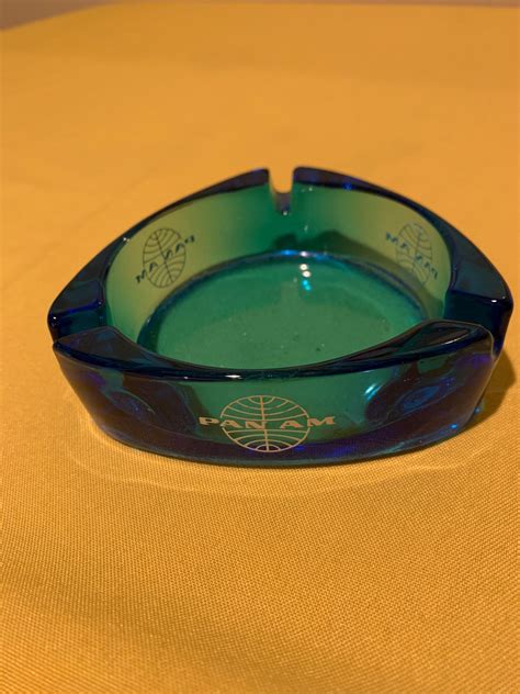 Have 1960s blue Pan AM ashtray, wondering about the value. Trillion shaped with white Glove logo