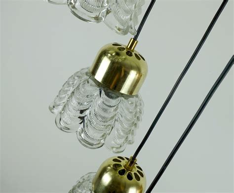 1960s mid century PENDANT LIGHT cascading lamp 7 flower-shaped glass shades and brass chandelier