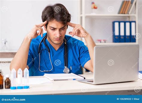 The Young Doctor Working in the Hospital Stock Photo - Image of laptop, care: 126289022