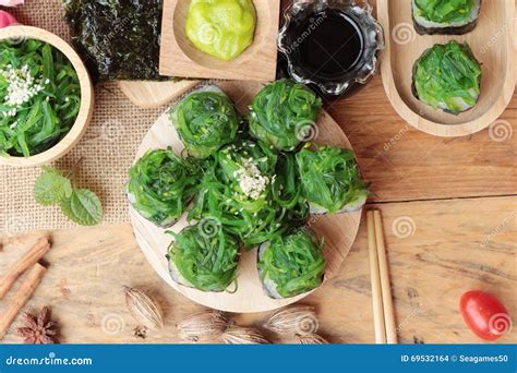 Sushi Roll and Seaweed Salad is Delicious. Stock Photo - Image of restaurant, lunch: 69532164