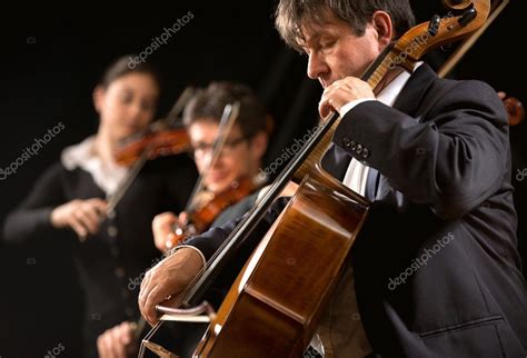 Symphony orchestra performance: celloist close-up — Stock Photo ...