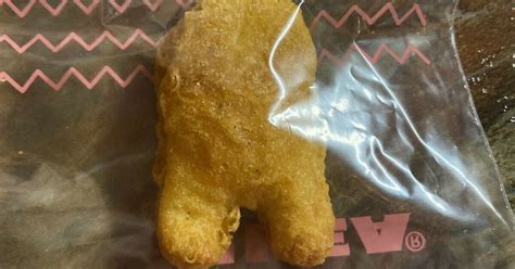 A very sus chicken nugget shaped like an Among Us crewmate sells for ...