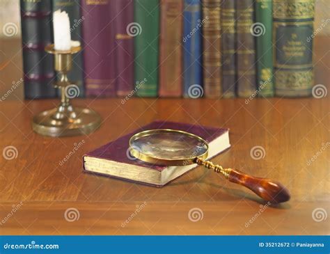 Magnifier and book stock photo. Image of books, leather - 35212672