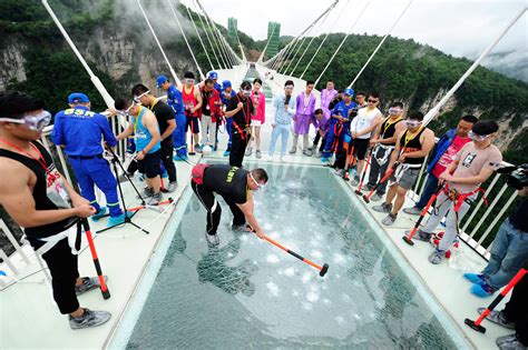 testing-the-zhangijaje-glass-bridge-in-china (4256×2832)