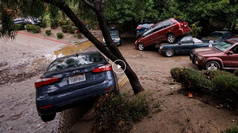 San Diego Floods Sweep Away Cars - The New York Times