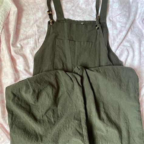 Dark green overalls that I wore throughout my... - Depop