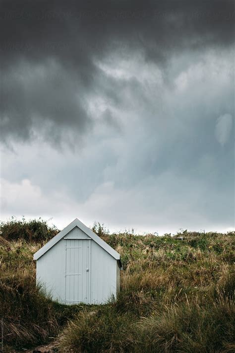 "Little Beach Hut." by Stocksy Contributor "Darren Muir" - Stocksy