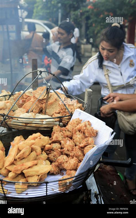 Fried street food on the streets of Jakarta, Indonesia Stock Photo - Alamy