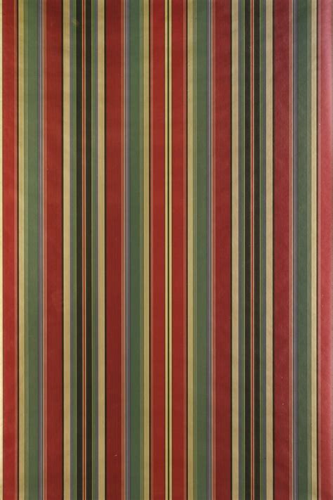 a red and green striped wallpaper with vertical stripes