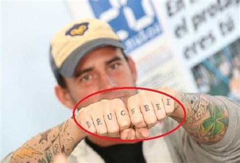 CM Punk’s 51 Tattoos & Their Meanings – Body Art Guru