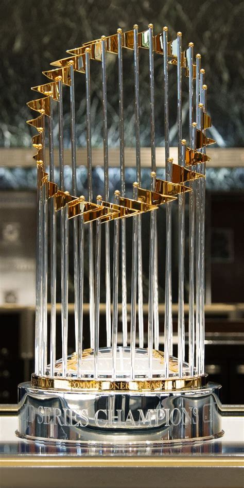 The Major League Baseball World Series trophy features 30 flags, one for each Major League team ...