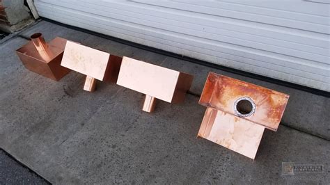 Custom copper scupper boxes with outlets