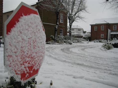 Snow covered stop sign by LittleBlackRose20 on DeviantArt