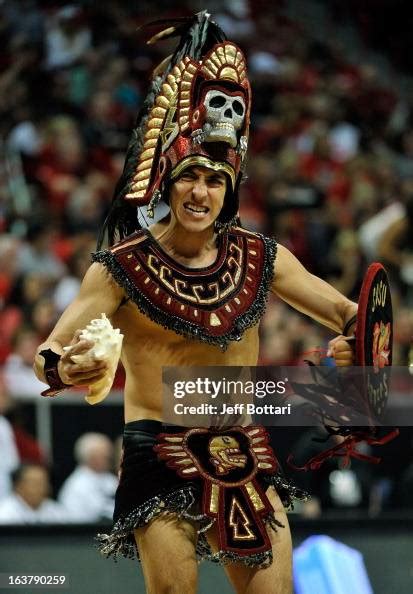 San Diego State Aztecs mascot Aztec Warrior appears on the court ...