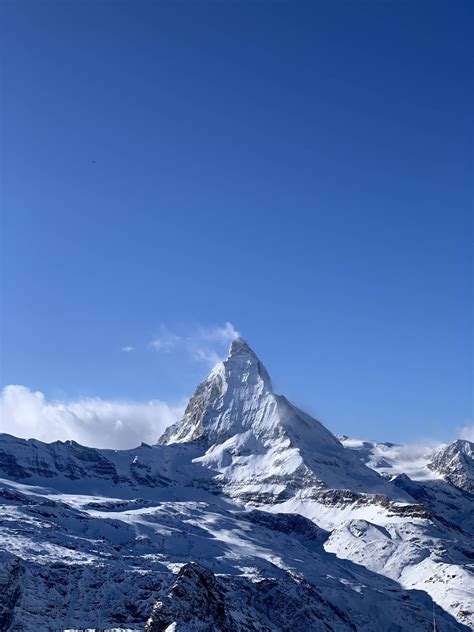 Amazing weather at the Matterhorn, Valais, Switzerland [OC][3024x4032] : EarthPorn