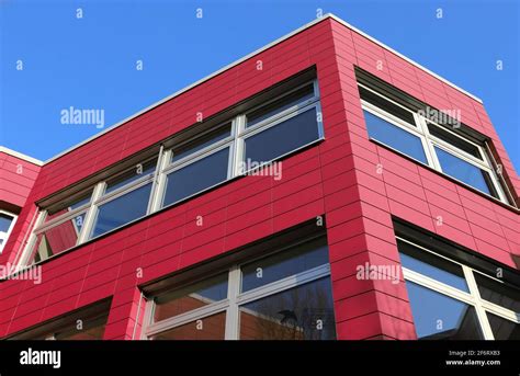 Modern building with facade cladding Stock Photo - Alamy