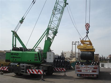 Loading safely: SENNEBOGEN 640 Harbour Mobile Crane with magnet system - SENNEBOGEN ...