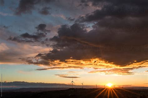 "Wind Turbines During Sunset" by Stocksy Contributor "Blue Collectors ...