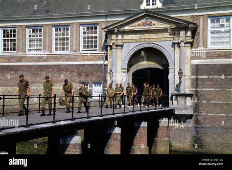 Soldiers leaving the castle, Kasteel van Breda, the KMA Royal Stock Photo, Royalty Free Image ...