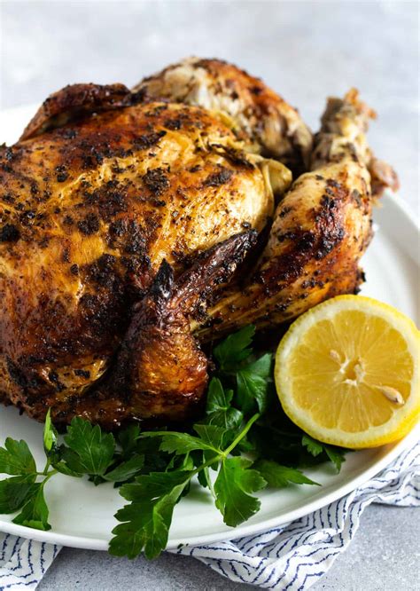 How to Grill a Whole Chicken - Garnish with Lemon