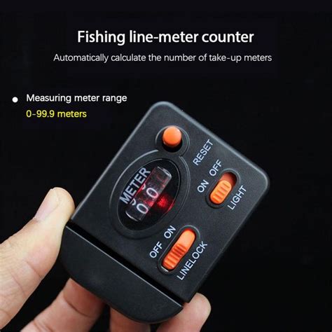 a hand holding an electronic device with the words fishing line - meter counter on it