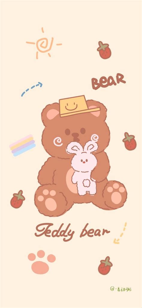 a brown teddy bear sitting next to an apple