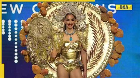 Miss Universe 2023: Miss El Salvador walks in golden bitcoin themed ...