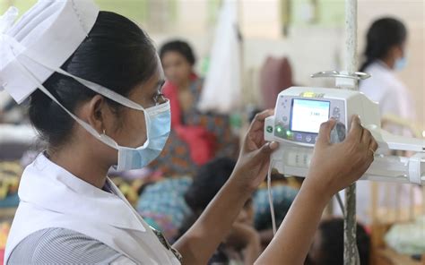 A nurse operates a new piece of medical equipment at Eravu… | Flickr