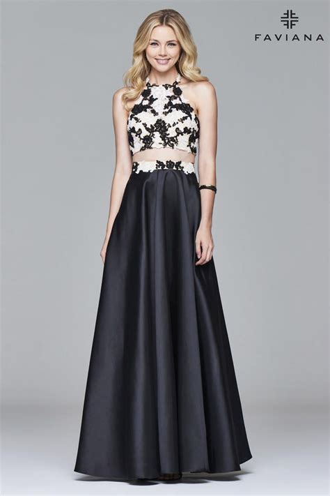 Faviana 7936 is a modern take on the classic ballgown. The halter crop top is form fitting, and ...