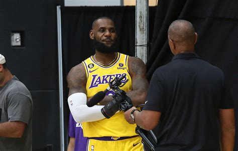 WATCH: LeBron James Restrained By Ref As Heckler Loudly Attacks His Hairline