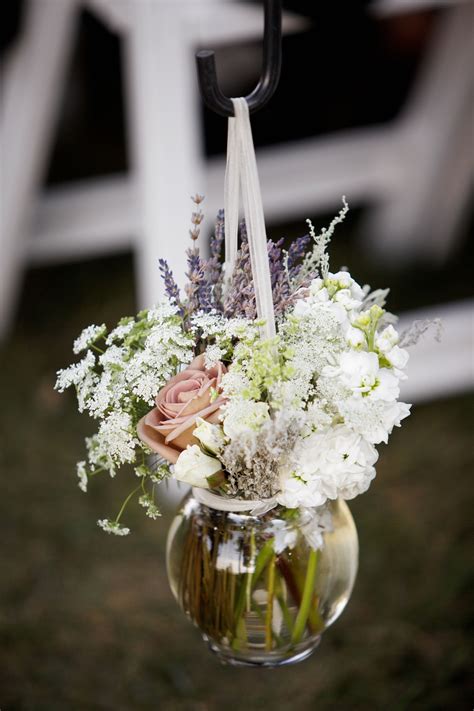 Hanging Flower Arrangements as Aisle Decorations