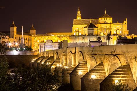 Night View of the Mezquita and Roman Bridge in Cordoba, Spain Stock Photo - Image of ancient ...