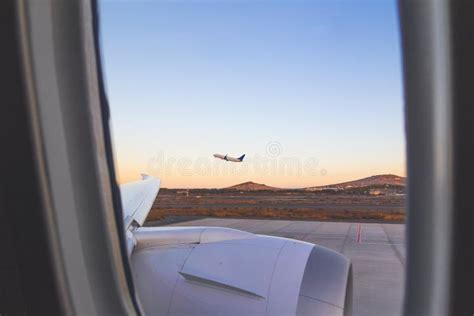 Plane Taking Off from the Airport, Seen from the Window of the Plane ...