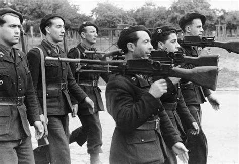 Vichy French Fascist "Milice" members carrying Bren Guns and No.4 Lee ...