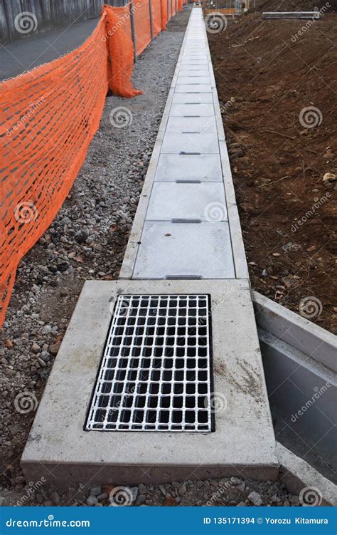 Street gutter construction stock photo. Image of industry - 135171394