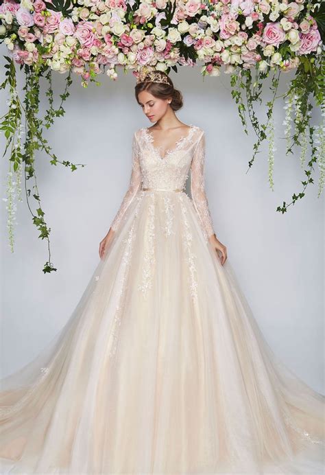 Cream v-neck wedding ball gown with lace sleeves // The Wedding Scoop's favorite Rico-A-Mona ...