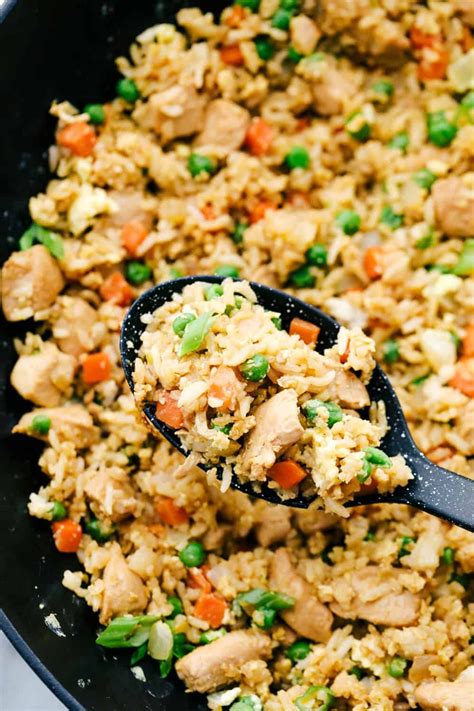 This chicken fried rice has moist and tender chicken with flavorful peas and carrots an… in 2020 ...